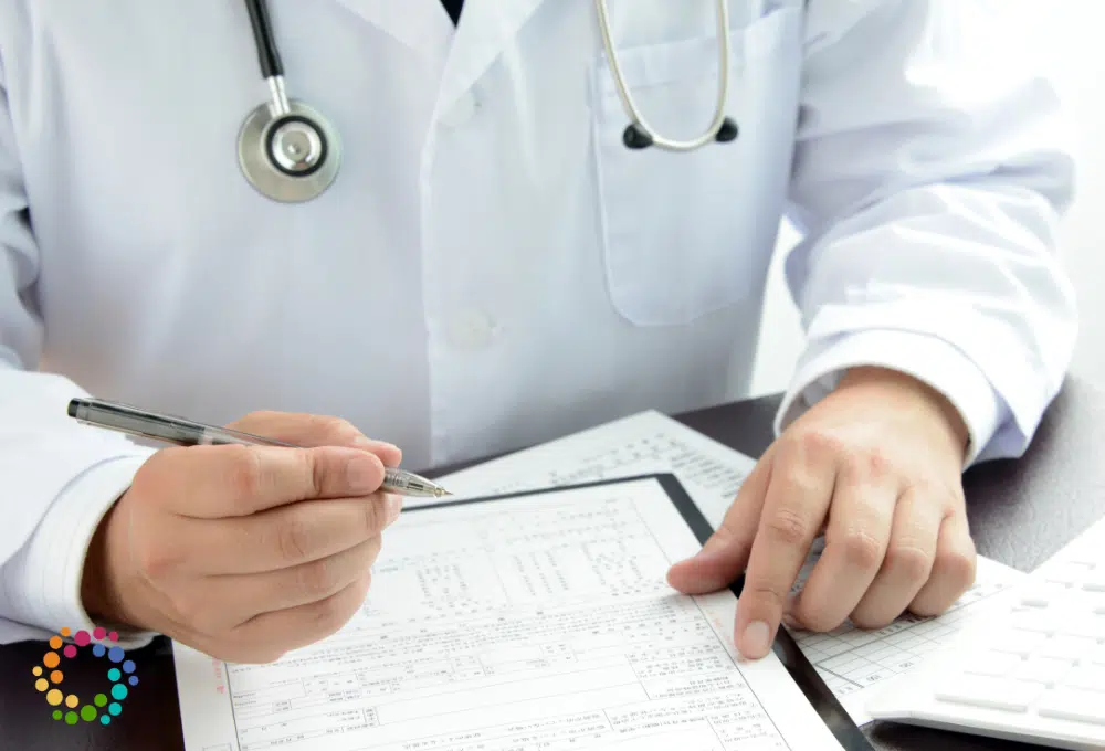 Doctor reviewing charts